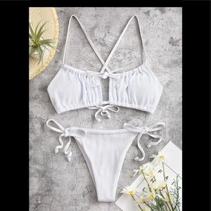 Textured ribbed crisscross tie tanga bikini.